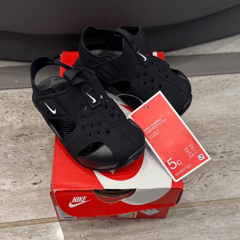 Nike Kids Black Sandals with White Accents